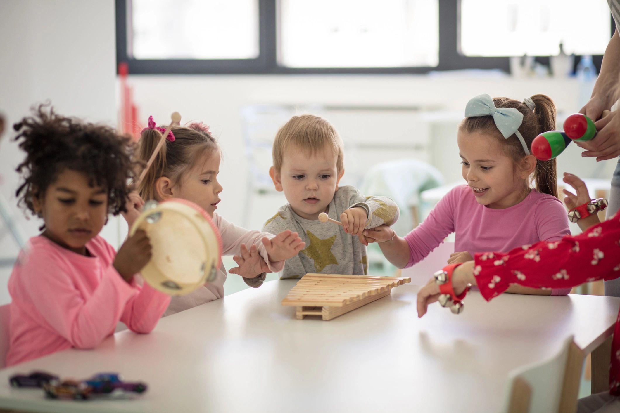 Children making music together in preschool